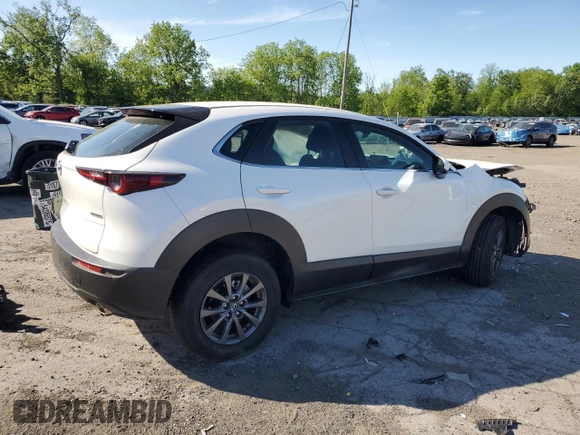 2023 Mazda CX-30 S with VIN 3MVDMBAM0PM506565, listed as a Copart auction lot 57699125 with 7,345 mi miles and Salvage title. Bid and sale history available at DreamBid. Image 3.