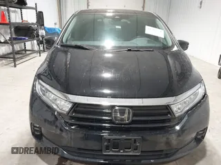 2023 Honda Odyssey Touring z VIN 5FNRL6H85PB039450, wystawiony jako IAAI lot #41504351 z przebiegiem 51 000 mil mil oraz . Historia ofert i sprzedaży dostępna na DreamBid. Obrazek 12.