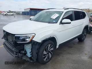 2024 Volkswagen Atlas SE z VIN 1V2JR2CA3RC508659, wystawiony jako IAAI lot #41430628 z przebiegiem 23 139 mil mil oraz . Historia ofert i sprzedaży dostępna na DreamBid. Obrazek 20.