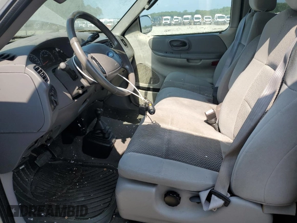 2003 Ford F-150 z VIN 2FTRX08W83CB03269, wystawiony jako Copart lot #63915625 z przebiegiem 150 127 mil mil oraz Czysty tytuł • Clean title. Historia ofert i sprzedaży dostępna na DreamBid. Obrazek 7.