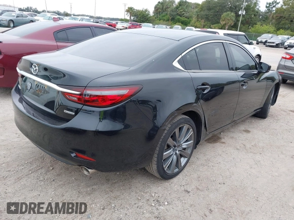2020 Mazda 6 Touring with VIN JM1GL1VM1L1525879, listed as a IAAI auction lot 41023192 with 43,531 mi miles. Bid and sale history available at carsss.com. Image 4.