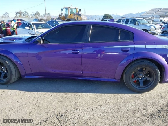 2023 Dodge Charger Scat Pack Widebody with VIN 2C3CDXGJ2PH638480, listed as a IAAI auction lot 41387362 with 8,363 mi miles. Bid and sale history available at carsss.com. Image 14.