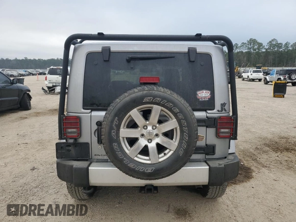 2015 Jeep Wrangler Sahara with VIN 1C4AJWBG8FL651169, listed as a Copart auction lot 44468995 with 119,419 mi miles and Salvage title. Bid and sale history available at DreamBid. Image 6.