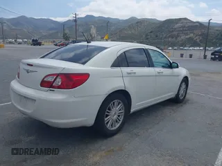 2007 Chrysler Sebring Touring with VIN 1C3LC56R07N536102, listed as a IAAI auction lot 41902390 with 203,037 mi miles and . Bid and sale history available at DreamBid. Image 4.