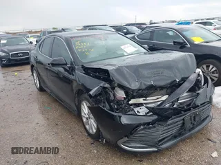 2023 Toyota Camry LE z VIN 4T1C11AKXPU766851, wystawiony jako IAAI lot #42176770 z przebiegiem 25 080 mil mil oraz . Historia ofert i sprzedaży dostępna na DreamBid. Obrazek 1.