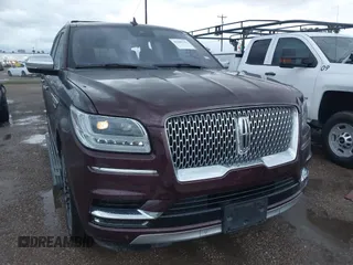2018 Lincoln Navigator Black Label z VIN 5LMJJ2TT0JEL18765, wystawiony jako IAAI lot #41889782 z przebiegiem 72 190 mil mil oraz . Historia ofert i sprzedaży dostępna na DreamBid. Obrazek 1.