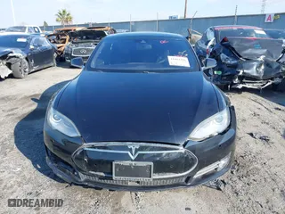 2015 Tesla Model S 85D with VIN 5YJSA1H46FF096603, listed as a IAAI auction lot 41084296 with 114,466 mi miles. Bid and sale history available at carsss.com. Image 12.