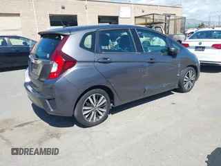2015 Honda Fit EX-L z VIN 3HGGK5H86FM746265, wystawiony jako IAAI lot #42253205 z przebiegiem 75 491 mil mil oraz . Historia ofert i sprzedaży dostępna na DreamBid. Obrazek 4.