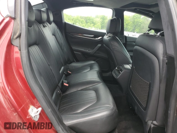 2014 Maserati Ghibli S Q4 with VIN ZAM57RTA7E1128937, listed as a Copart auction lot 54492205 with 79,897 mi miles and Salvage title. Bid and sale history available at DreamBid. Image 10.