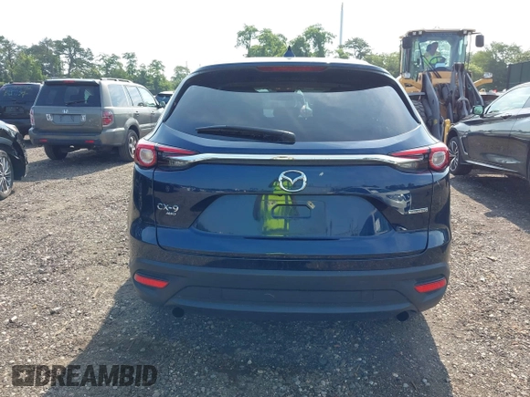 2021 Mazda CX-9 Touring with VIN JM3TCBCY7M0507699, listed as a IAAI auction lot 42603614 with 62,635 mi miles and . Bid and sale history available at DreamBid. Image 16.