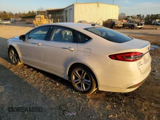 2018 Ford Fusion Hybrid S with VIN 3FA6P0UU4JR122581, listed as a Copart auction lot 88984465 with 81,554 mi miles and Salvage Title. Bid and sale history available at carsss.com. Image 2.