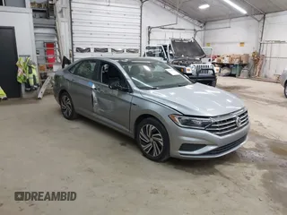 2021 Volkswagen Jetta SEL with VIN 3VWE57BUXMM056379, listed as a IAAI auction lot 42456450 with 34,697 mi miles and . Bid and sale history available at DreamBid. Image 1.