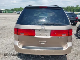 2000 Honda Odyssey EX with VIN 2HKRL1868YH513587, listed as a IAAI auction lot 42092115 with 302,555 mi miles and . Bid and sale history available at DreamBid. Image 16.