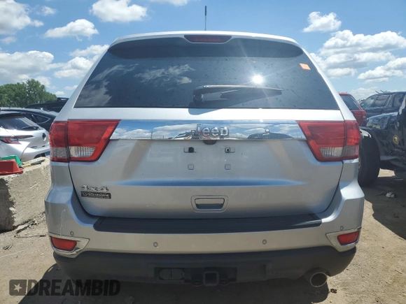 2011 Jeep Grand Cherokee 70th Anniversary with VIN 1J4RR4GG3BC678132, listed as a Copart auction lot 56079874 with 0 mi miles and Salvage Title. Bid and sale history available at carsss.com. Image 6.
