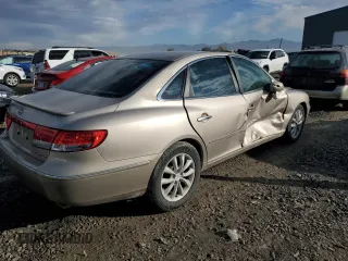 2007 Hyundai Azera SE z VIN KMHFC46F47A187747, wystawiony jako Copart lot #80963194 z przebiegiem 113 742 mil mil oraz Szkoda całkowita • Salvage title. Historia ofert i sprzedaży dostępna na DreamBid. Obrazek 3.