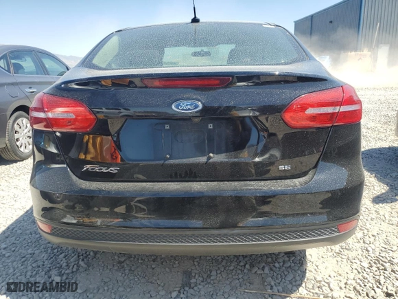 2018 Ford Focus SE with VIN 1FADP3F29JL262175, listed as a Copart auction lot 69452444 with 105,830 mi miles and Salvage Title. Bid and sale history available at carsss.com. Image 6.