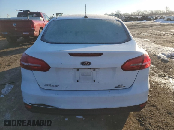 2016 Ford Focus SE with VIN 1FADP3F29GL404551, listed as a Copart auction lot 51205255 with 110,778 mi miles and Salvage Title. Bid and sale history available at DreamBid. Image 6.