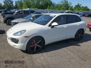 2012 Porsche Cayenne S Hybrid with VIN WP1AE2A25CLA90443, listed as a Copart auction lot 60108595 with 141,595 mi miles and Clean title. Bid and sale history available at DreamBid. Image 1.