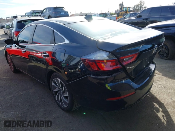 2020 Honda Insight Touring with VIN 19XZE4F91LE010778, listed as a IAAI auction lot 41430937 with 29,454 mi miles and . Bid and sale history available at carsss.com. Image 3.