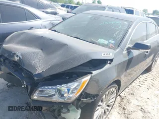 2014 Buick LaCrosse Premium II with VIN 1G4GF5G34EF118644, listed as a IAAI auction lot 41874928 with 140,448 mi miles. Bid and sale history available at carsss.com. Image 2.