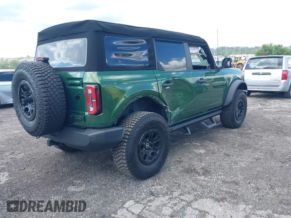 2023 Ford Bronco with VIN 1FMEE5DP0PLB80676, listed as a IAAI auction lot 42210054 with 6,796 mi miles and . Bid and sale history available at DreamBid. Image 4.