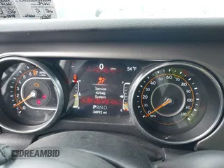 2021 Jeep Wrangler Unlimited Sport S with VIN 1C4HJXDG1MW836029, listed as a IAAI auction lot 41811840 with 34,992 mi miles. Bid and sale history available at carsss.com. Image 7.
