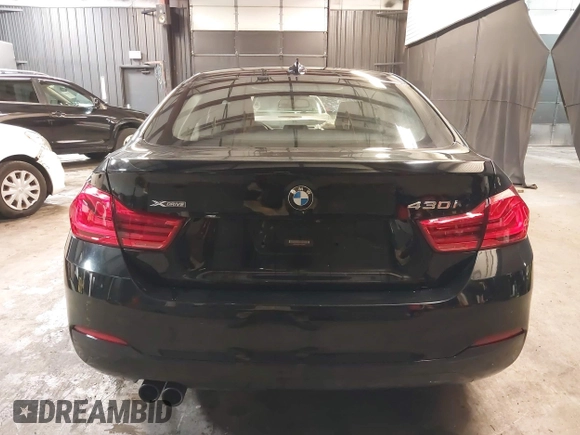 2018 BMW 4 Series 430i xDrive with VIN WBA4J3C56JBL03844, listed as a IAAI auction lot 40864200 with 56,115 mi miles and . Bid and sale history available at DreamBid. Image 17.