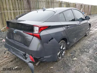 2019 Toyota Prius L Eco with VIN JTDKARFU8K3085918, listed as a IAAI auction lot 41107891 with 166,295 mi miles. Bid and sale history available at carsss.com. Image 4.