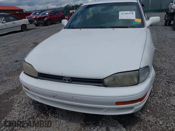 1992 Toyota Camry LE z VIN 4T1SK12E0NU021654, wystawiony jako IAAI lot #42305378 z przebiegiem 305 421 mil mil oraz . Historia ofert i sprzedaży dostępna na DreamBid. Obrazek 12.