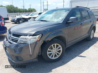 2017 Dodge Journey SXT z VIN 3C4PDCBB9HT507917, wystawiony jako IAAI lot #42322823 z przebiegiem 131 011 mil mil oraz . Historia ofert i sprzedaży dostępna na DreamBid. Obrazek 2.
