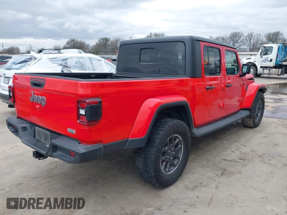 2022 Jeep Gladiator High Altitude with VIN 1C6HJTFG0NL105043, listed as a IAAI auction lot 41290790 with 73,595 mi miles and . Bid and sale history available at DreamBid. Image 4.