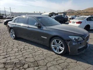 2014 BMW 7 Series 740Li with VIN WBAYE4C56ED138044, listed as a Copart auction lot 74859434 with 110,209 mi miles and Clean Title. Bid and sale history available at carsss.com. Image 4.