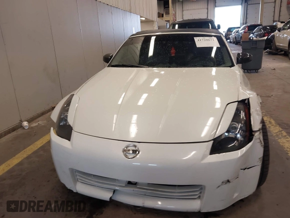2005 Nissan 350Z Touring with VIN JN1AZ36A45M754923, listed as a IAAI auction lot 41720671 with 124,916 mi miles. Bid and sale history available at carsss.com. Image 12.