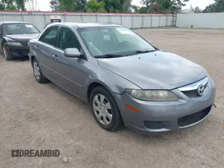 2006 Mazda 6 i with VIN 1YVFP80CX65M36617, listed as a IAAI auction lot 42059906 with 189,192 mi miles. Bid and sale history available at carsss.com. Image 1.