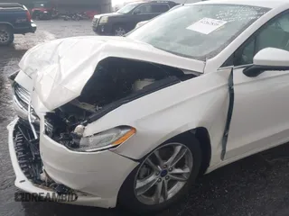 2018 Ford Fusion SE z VIN 3FA6P0H75JR159448, wystawiony jako IAAI lot #42262839 z przebiegiem 144 353 mil mil oraz . Historia ofert i sprzedaży dostępna na DreamBid. Obrazek 17.