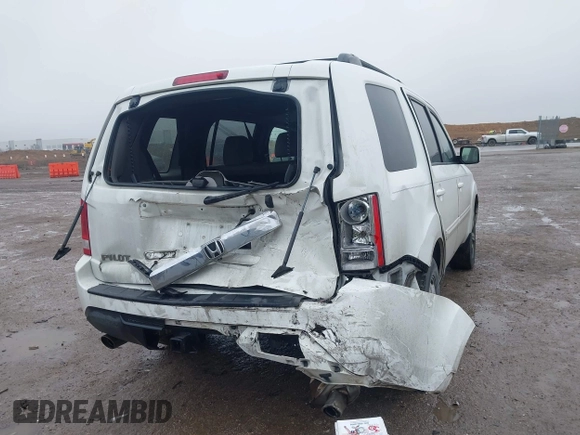 2013 Honda Pilot EX-L with VIN 5FNYF3H52DB014959, listed as a IAAI auction lot 41459164 with 174,136 mi miles and . Bid and sale history available at DreamBid. Image 4.