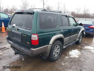 2000 Toyota 4Runner Limited with VIN JT3HN87R6Y0265299, listed as a IAAI auction lot 41569862 with 216,917 mi miles. Bid and sale history available at carsss.com. Image 4.