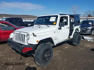 2017 Jeep Wrangler Unlimited Sahara with VIN 1C4BJWEG2HL552382, listed as a IAAI auction lot 41631092 with 96,097 mi miles and . Bid and sale history available at DreamBid. Image 2.