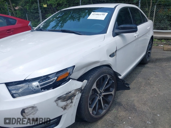 2015 Ford Taurus SHO with VIN 1FAHP2KT5FG206096, listed as a IAAI auction lot 42486198 with 120,940 mi miles and . Bid and sale history available at DreamBid. Image 6.