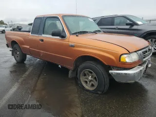 2000 Mazda B-Series 2WD Truck DS with VIN 4F4YR16VXYTM12123, listed as a Copart auction lot 82332754 with 139,886 mi miles and Salvage Title. Bid and sale history available at carsss.com. Image 4.