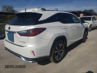 2021 Lexus RX 350L with VIN JTJHZKEA1M2018925, listed as a Copart auction lot 84663144 with 4,350 mi miles and Salvage title. Bid and sale history available at DreamBid. Image 4.
