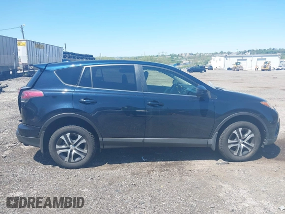 2017 Toyota RAV4 LE with VIN JTMBFREV8HJ168975, listed as a IAAI auction lot 42139354 with 91,394 mi miles and . Bid and sale history available at DreamBid. Image 13.