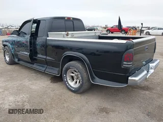 1998 Dodge Dakota SLT with VIN 1B7GL22Y5WS505002, listed as a IAAI auction lot 41544913 with 205,481 mi miles and . Bid and sale history available at DreamBid. Image 3.