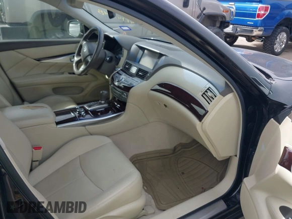 2015 Infiniti Q70 with VIN JN1BY1PP9FM601468, listed as a IAAI auction lot 41745618 with 138,932 mi miles and . Bid and sale history available at DreamBid. Image 5.