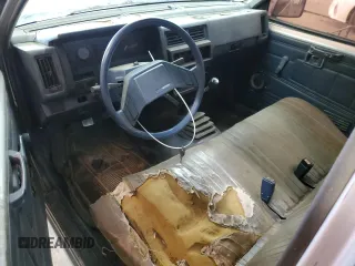 1987 Nissan Hardbody E z VIN JN6ND11S1HW006640, wystawiony jako Copart lot #78160004 z przebiegiem 403 406 mil mil oraz Szkody całkowita. Historia ofert i sprzedaży dostępna na DreamBid. Obrazek 8.