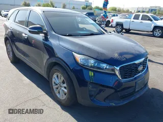 2019 Kia Sorento L z VIN 5XYPG4A36KG529394, wystawiony jako IAAI lot #42260516 z przebiegiem 124 564 mil mil oraz . Historia ofert i sprzedaży dostępna na DreamBid. Obrazek 1.