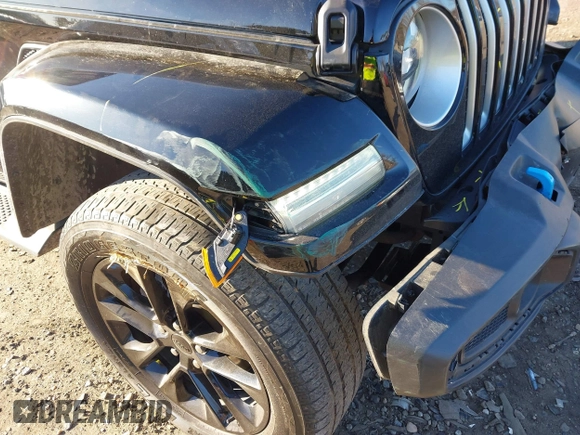 2023 Jeep Wrangler Sahara with VIN 1C4JJXP63PW525274, listed as a IAAI auction lot 41743099 with 38,484 mi miles and . Bid and sale history available at DreamBid. Image 18.