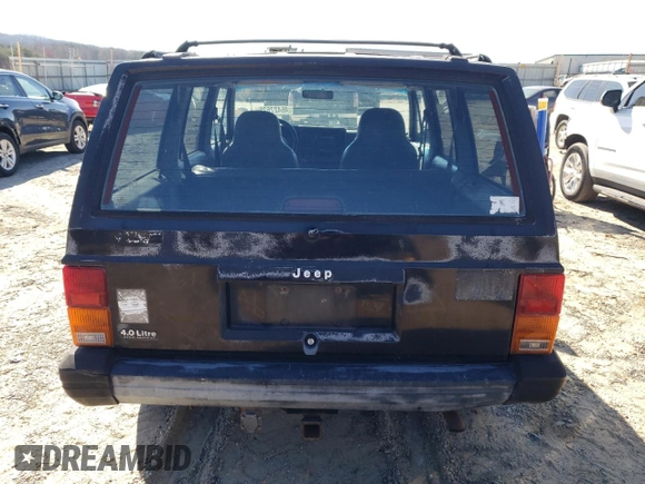 1996 Jeep Cherokee Sport with VIN 1J4FJ68S1TL317265, listed as a Copart auction lot 46427625 with 265,554 mi miles and Clean Title. Bid and sale history available at carsss.com. Image 6.
