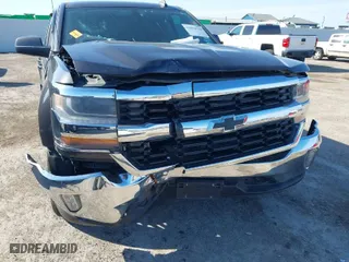 2016 Chevrolet Silverado 1500 LT with VIN 1GCVKREC7GZ123923, listed as a IAAI auction lot 41052739 with 122,837 mi miles. Bid and sale history available at carsss.com. Image 6.