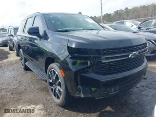 2023 Chevrolet Tahoe RST with VIN 1GNSCRKD7PR225100, listed as a IAAI auction lot 41758562 with 34,393 mi miles. Bid and sale history available at carsss.com. Image 1.